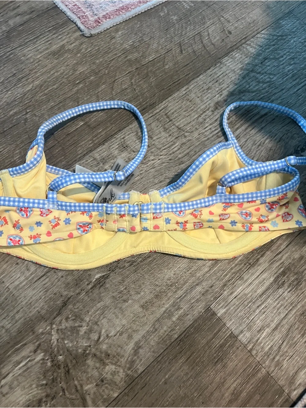 Frankie’s bikinis vs pink buttercup bikini top in yellow and blue